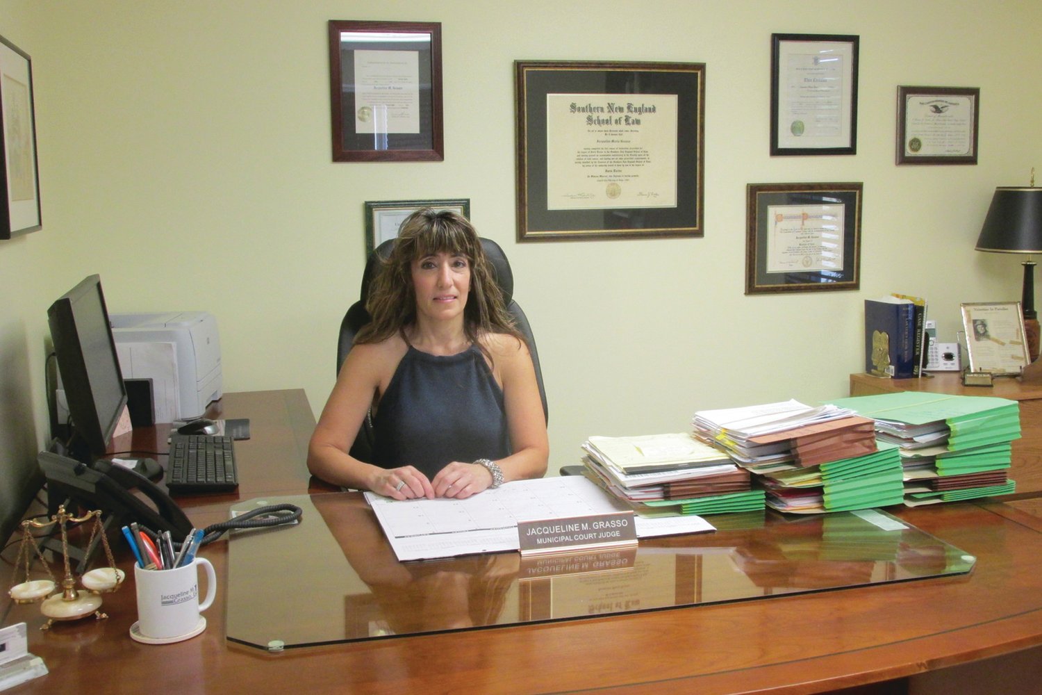 JOHNSTON JURIST: In this 2016 file photo, Attorney Jacqueline M. Grasso sits in her 1310 Atwood Ave. law office. Grasso served as Johnston’s Chief Municipal Court Judge for a decade prior to her replacement last week.